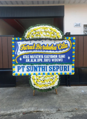 Papan Bunga Duka di Tomolito